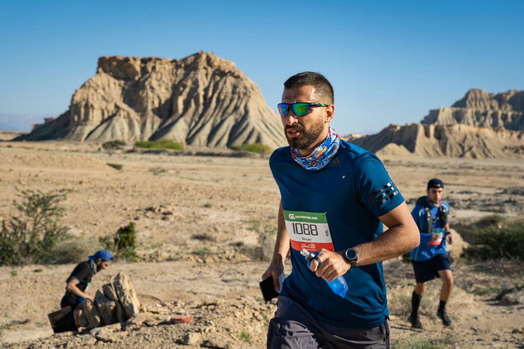 3 marathon runners in the desert